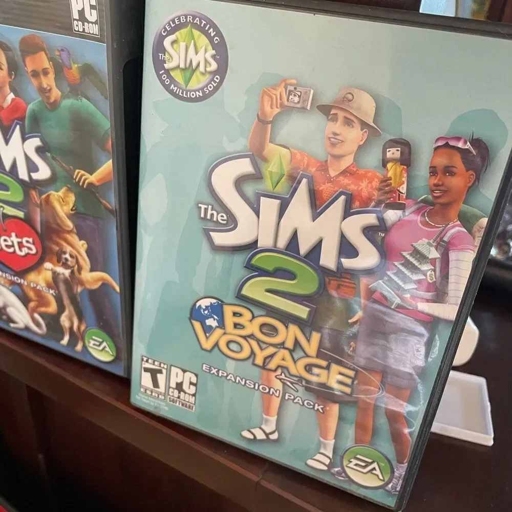 The SIMS PlayStation Vintage Side Video Game Lot PC DVD Pets Family Delux Sets